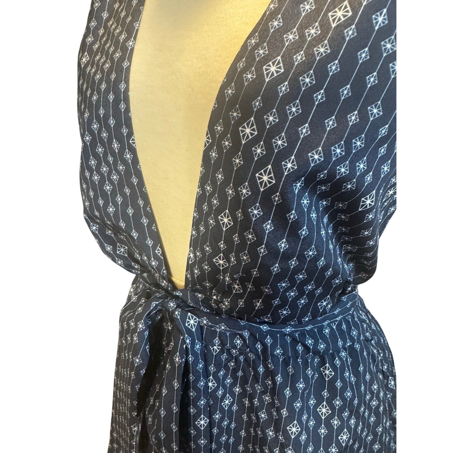 Sexy , classy deep V romper